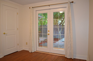 French doors from living room to backyard.